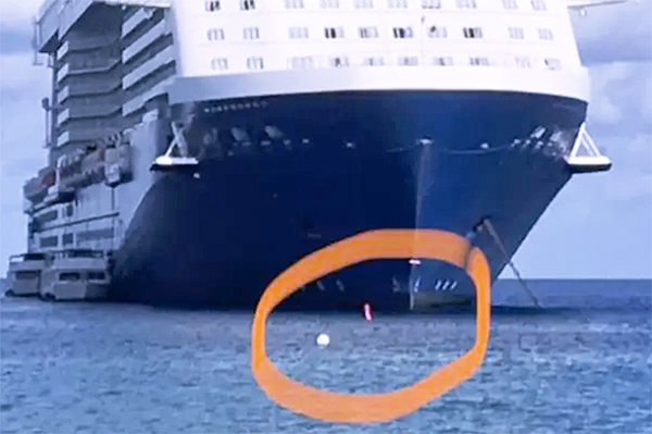 Celebrity Equinox anchored close to the Devil's Grotto dive site