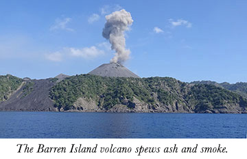 The Barren Island volcano spews ash and smoke.